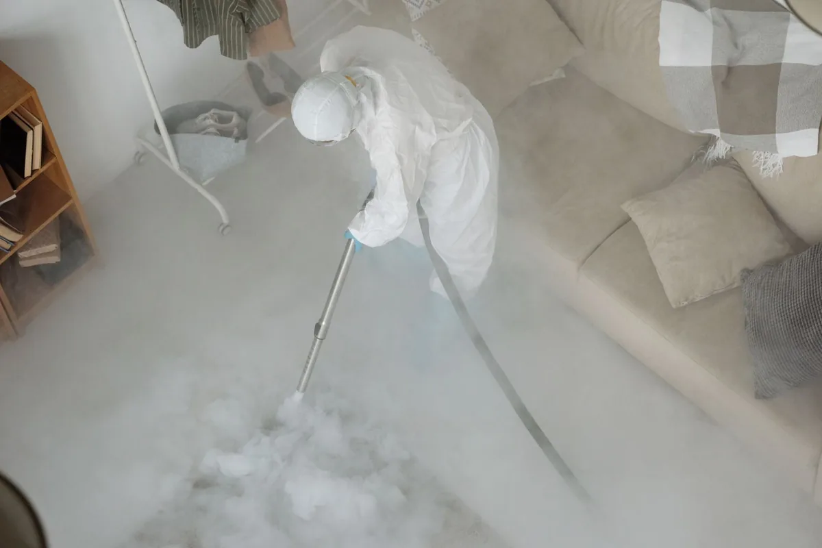Biohazard cleanup technician in protective equipment, Sangaree, SC